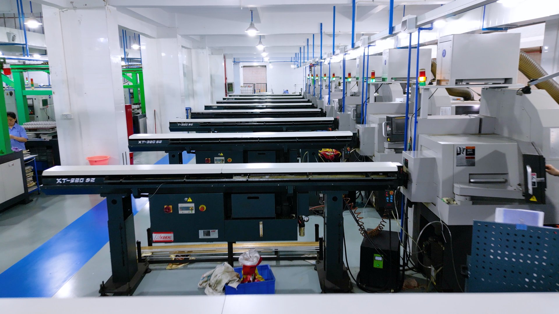 Row of CNC machining equipment XT-220 ready for production