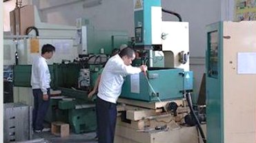 Operator running a machining station