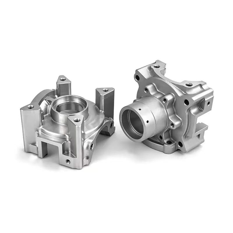 Collection of CNC turned steel components — shafts, spacers and precision small parts in carbon and alloy steel